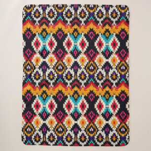 Farbiges Ikat-Inspiriertes geometrisches Muster Sherpadecke