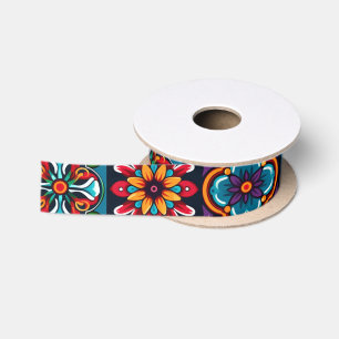 Farbiges Mosaikfliesen mit Blume Satinband