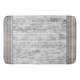 Farbtöne aus grauem Marmor und Streifen Badematte