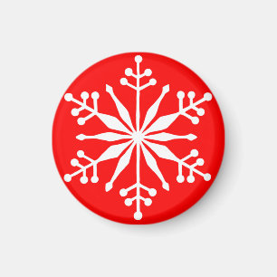 Feierliche Schneeflocke auf einem roten Ziermagnet Magnet
