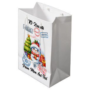 Feierlicher Weihnachtsfeiertag mit festlichem Schn Mittlere Geschenktüte