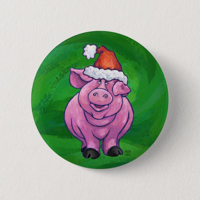 Feierliches Schwein in Weihnachtsmannmütze auf Grü Button (Vorderseite)