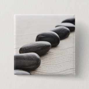 Felsen auf Sand Button