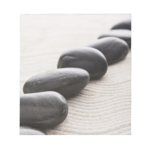 Felsen auf Sand Notizblock