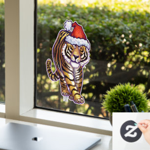 Feste Tiger in einer Weihnachtsmannmütze Fensterkl Fensteraufkleber