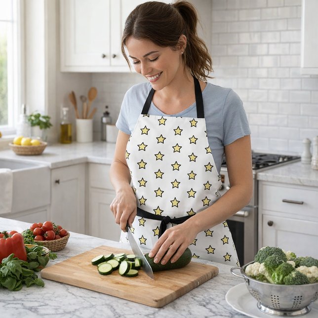 Fette gelbe Sternmuster-Grafikdesign Schürze (An apron with a pattern of yellow and black stars)