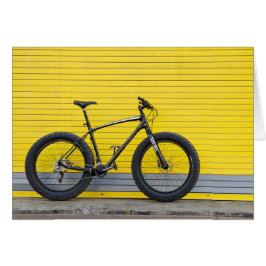 Fettrad an der gelben Wand