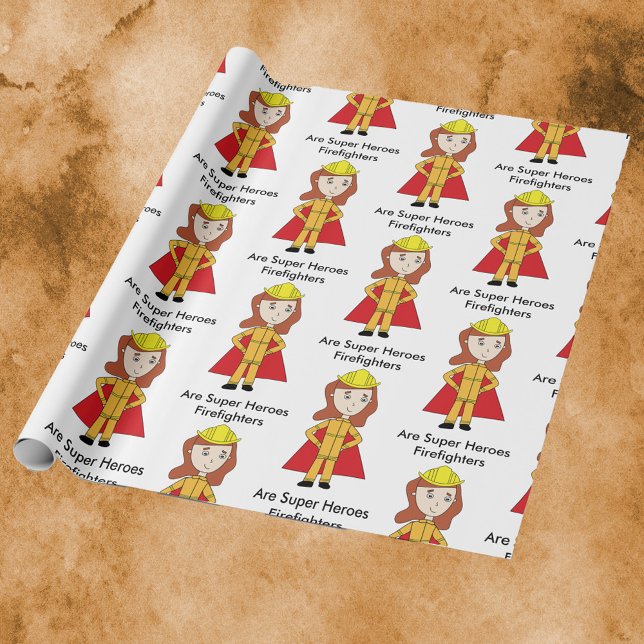 Feuerwehrmänner Frauen Super Hero Funny Geschenkpapier (Wrapping paper featuring a female firefighter and the text, "Firefighters Are Super Heroes".)