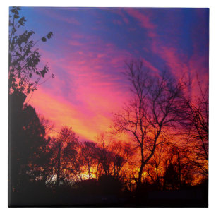 Fiery Sunset durch die Bäume Fliese