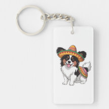 Fiesta Papillon Dog Wearing Sombrero und Sarape