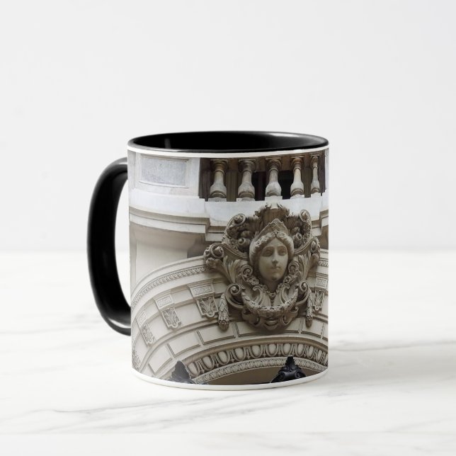 Figur über der Tür Tasse (Vorderseite Links)