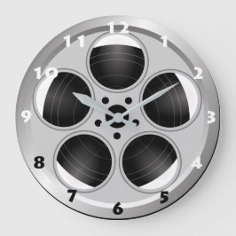 FILMREEL MIT SCHWARZEN UND WEISSEN ZAHLEN GROßE WANDUHR