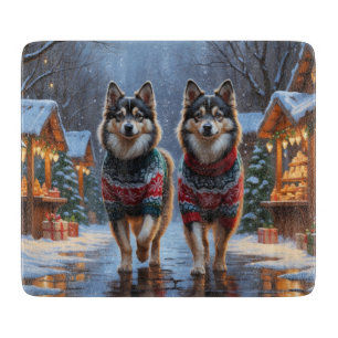 Finnische Lapphund-Hunde Weihnachten Schnee Feiert Schneidebrett