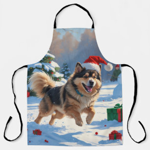 Finnischer Lapphund läuft durch Schnee mit Weihnac Schürze