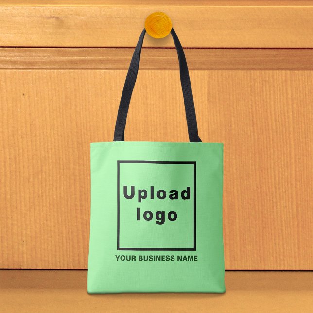 Firmenname und Logo auf der hellgrünen Tasche (Light green tote bag with your business name and logo)