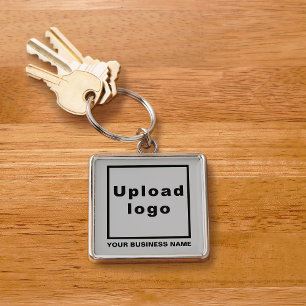 Firmenname und Logo auf Grau-Platz-Premium Schlüsselanhänger