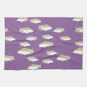 Fische auf lila geschirrtuch