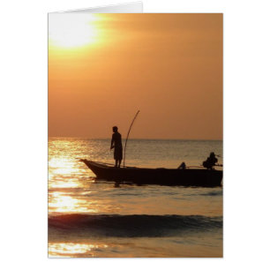 Fischerboot und Sonnenuntergang