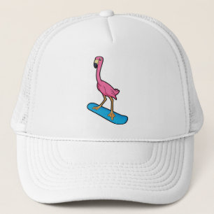 Flamingo als Snowboarder mit Snowbaord Truckerkappe
