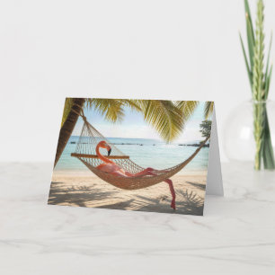 Flamingo zum Geburtstag liegt in einer Hängematte Karte
