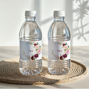 Flasche mit grünem Blütenburgund Wasserflaschenetikett