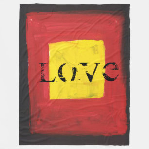 Fleece Blanket Schwarz, Rot und Gelb.