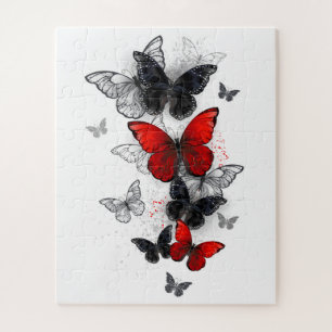 Fliegende schwarze und rote Morpho-Schmetterlinge Puzzle