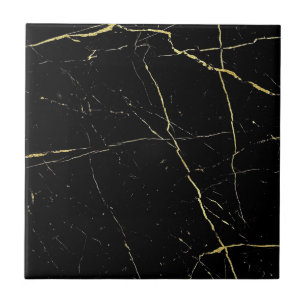Fliesen aus schwarzem und goldenen Boden