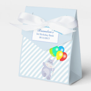Flusspferd steigt geschenkschachtel