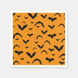 Flying bats on orange serviette