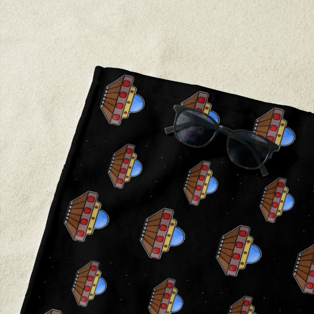 Flying ufo in schwarz strandtuch (Beispiel)