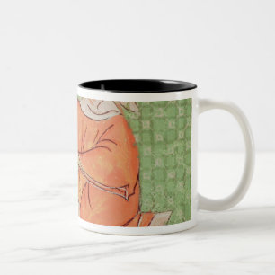 Fol.58r Februar: Erwärmung durch das Feuer Zweifarbige Tasse