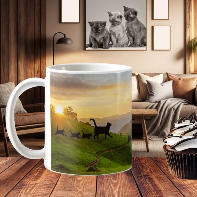 Folgen Sie der Cat Trail Fun Family Tasse (A fun and whimsical mug featuring cat families walking through a hilly landscape at sunset)