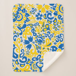 Folklore-Muster mit ukrainischen Flaggenfarben Sherpadecke