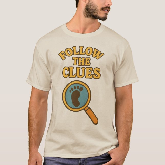 “Follow the Clues” T-Shirt (Vorderseite)