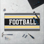 FOOTBALL Sporty Gray Black Yellow Racing Streifen Schreibtischunterlage<br><div class="desc">Dieses farbenfrohe,  sportliche Design mit athletischem FOOTBALL-Text in einem breiten,  mittleren schwarzen Streifen mit goldgelben,  weißen und grauen Rennstreifen. Die Farben und Texte in diesem Design können personalisiert sein.</div>
