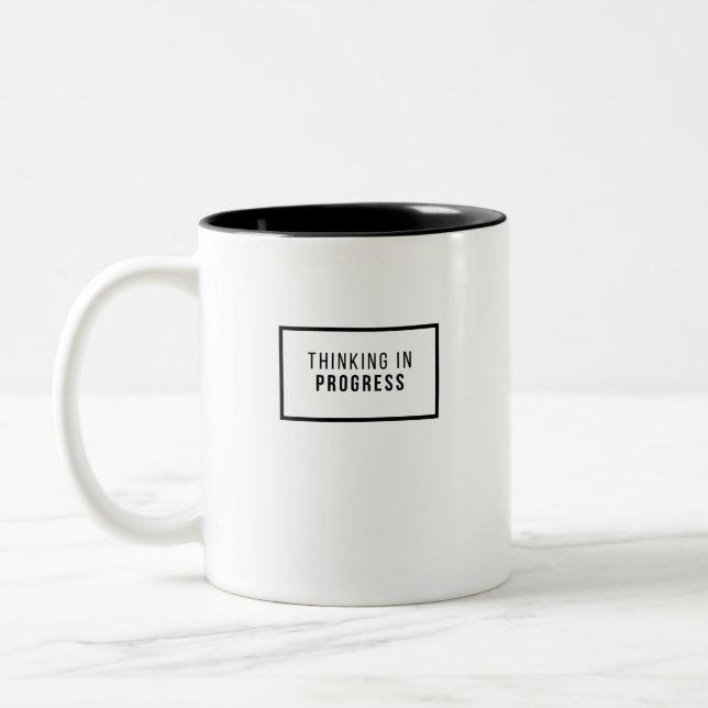 FORTSCHRITTLICHE DENKEN ZWEIFARBIGE TASSE (Links)
