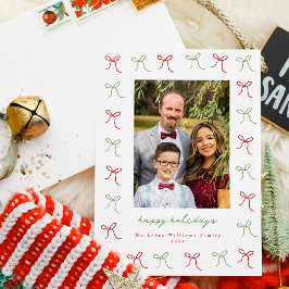 Foto aus Rahmen mit weißer und roter Hand Feiertagskarte