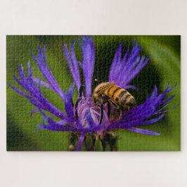 Foto einer wunderschönen lila Blume mit Honigbiene Puzzle