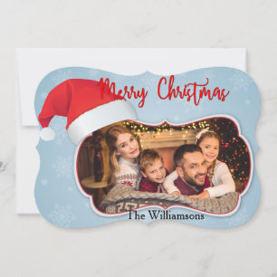 Foto-Fenster mit Weihnachtsmannmütze Extravagante Feiertagskarte