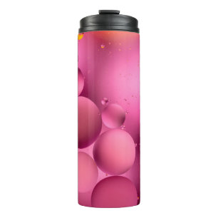 Foto, helle ölige Tropfen in Wasser mit bunten Ba Thermosbecher