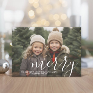 Foto mit riesiger MERRY-Schrift weißer Überlagerun Feiertagskarte
