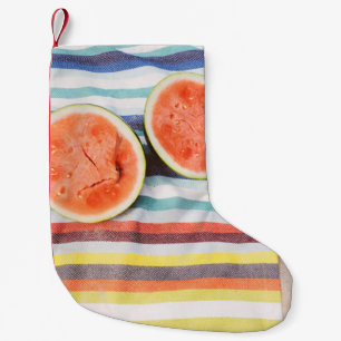 Foto von Wassermelonenscheiben in Scheiben Kleiner Weihnachtsstrumpf