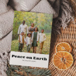 Foto Weltfrieden Frohe Weihnachten<br><div class="desc">Dieses familiäre Foto Weltfrieden frohe Weihnachtsfeier Postkarte ist perfekt für eine einfache Weihnachtsfeier. Das Design besticht durch einen eleganten Schriftart,  um Ihre Veranstaltung zu verschönern.</div>