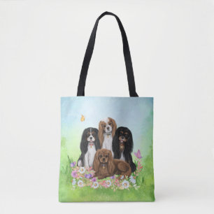 Four Cavalier King Charles Spaniels in Blume  