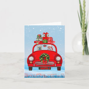 Französische Bulldogge im Auto mit dem Weihnachtsm Karte