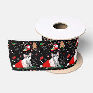 Französische Bulldogge-Welpe in Santa-Hutmuster Satinband
