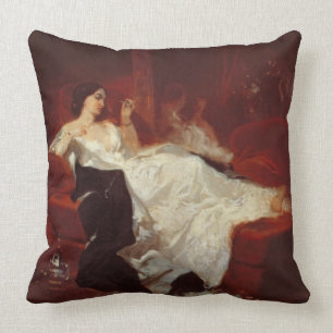 Frau auf einem roten Sofa Kissen