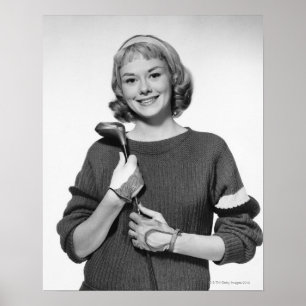 Frau, die Golfclub hält Poster