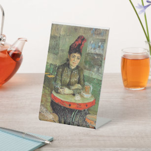 Frau im Café Tambourin, Sockelschild